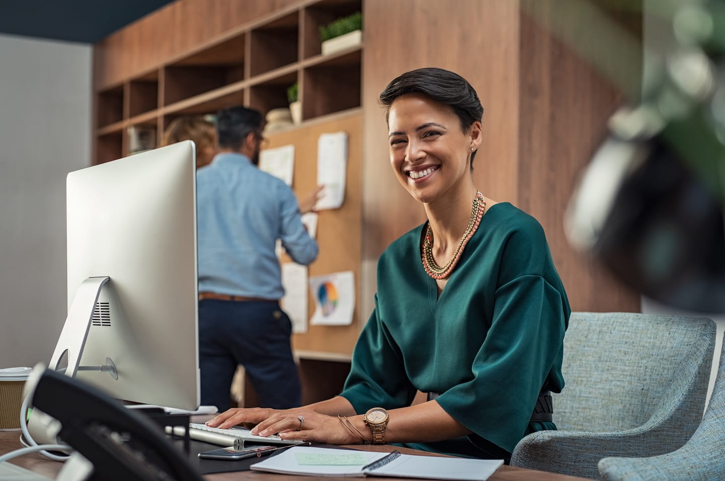 young businesswoman smiling at office LGQRJY2